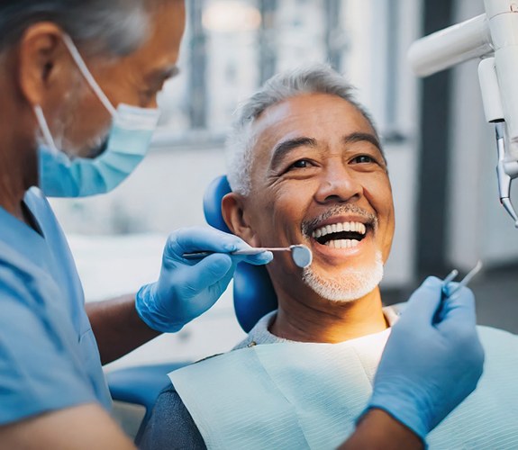 Man after learning how dentures are made in Franklin Park