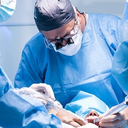Dental team working during dental implant placement surgery