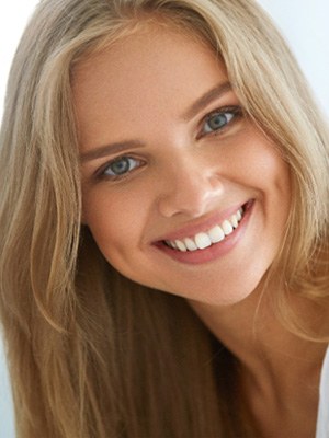 closeup of young woman smiling