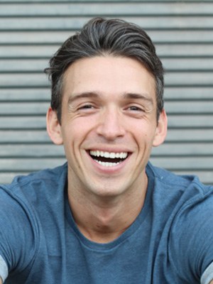 closeup of young man smiling
