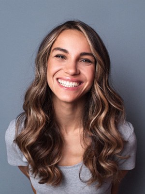 closeup of young woman smiling 