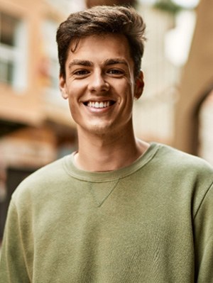 closeup of young man smiling