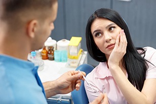 Female patient listening to a dentist