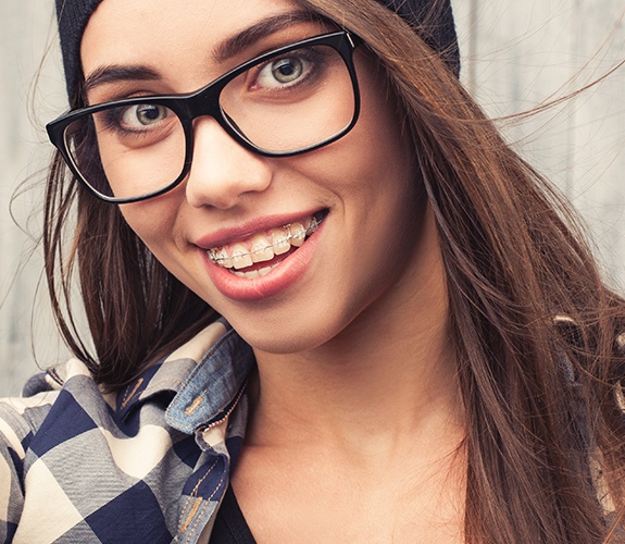 Woman with tooth colored braces