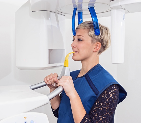 Woman receiving 3 D C T cone beam scans