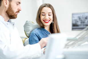 female patient learning about the cost of teeth whitening